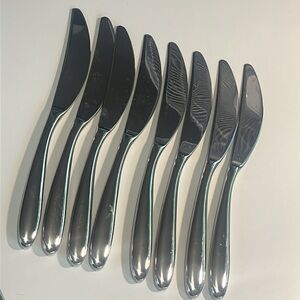 Set of 8 nambe Bend butter knives EUC